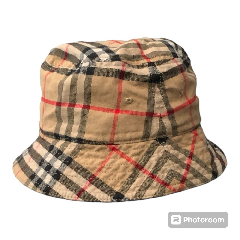 The classic Burberry Check Bucket Hat-size medium-new with tags and never worn.